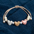 Bracelet coeur en céramique beige