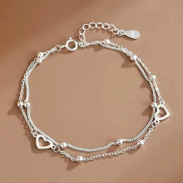 Bracelet double coeur et perles