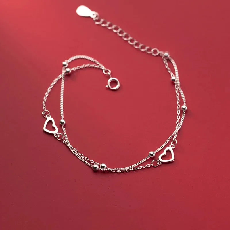 Bracelet double coeur et perles