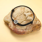 Náramok z lana so židovským symbolom čierna a strieborná <span data-glossary-id="star_of_david">hviezda Dávida</span>