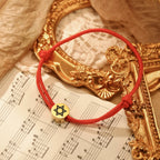 Náramok z lana so židovským symbolom červená a zlatá <span data-glossary-id="star_of_david">hviezda Dávida</span>