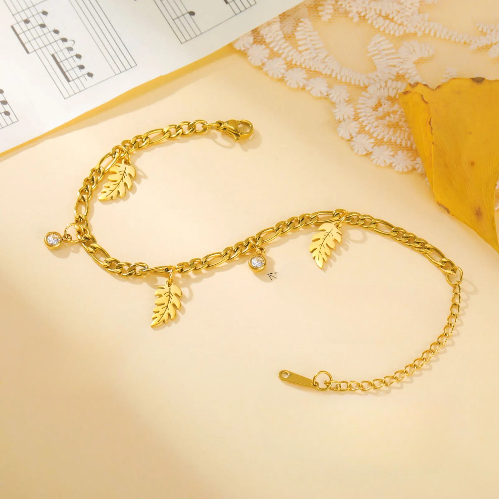 Palmblatt- und Zirkonarmband 