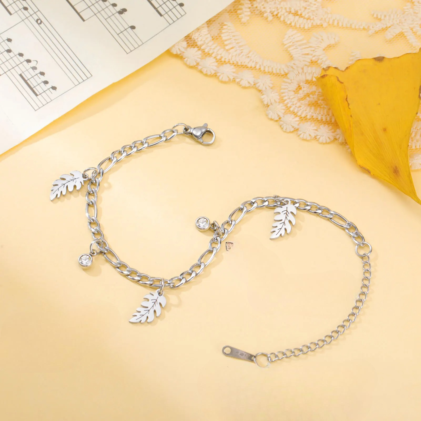 Palmblatt- und Zirkonarmband 