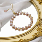 Armband mit rosa Perlen