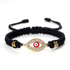 Geflochtenes Armband mit Zirkonia und türkischem Bösen Blick in Schwarzgold