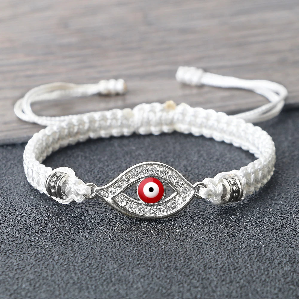 Geflochtenes Armband mit Zirkonia und türkischem Bösen Blick in Weiß-Silber