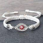 Geflochtenes Armband mit Zirkonia und türkischem Bösen Blick in Weiß-Silber