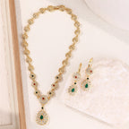Collana con ciondolo e orecchini pendenti tradizionali per matrimonio arabo verde