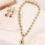 Collana con ciondolo e orecchini pendenti tradizionali per matrimonio arabo rosso