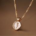 Collier avec pendentif fleur de rose dorée