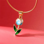 Necklace with white and blue colored enamel tulip flower pendant