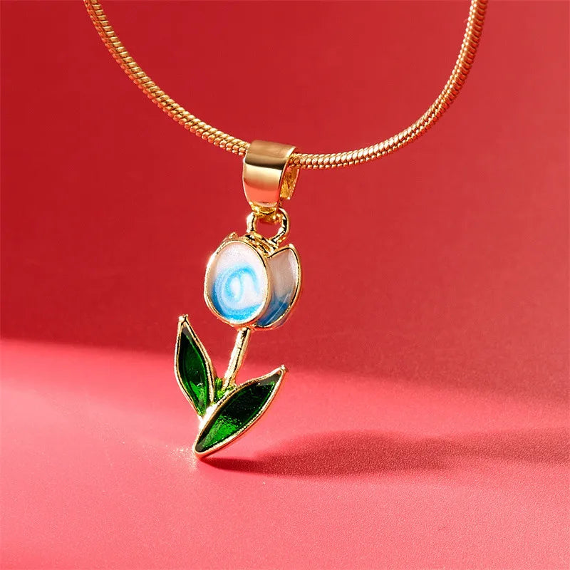 Necklace with white and blue colored enamel tulip flower pendant