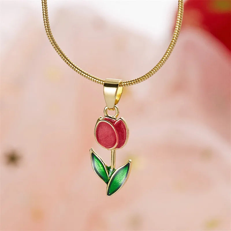 Necklace with red colored enamel tulip flower pendant