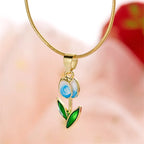 Necklace with white and blue colored enamel tulip flower pendant