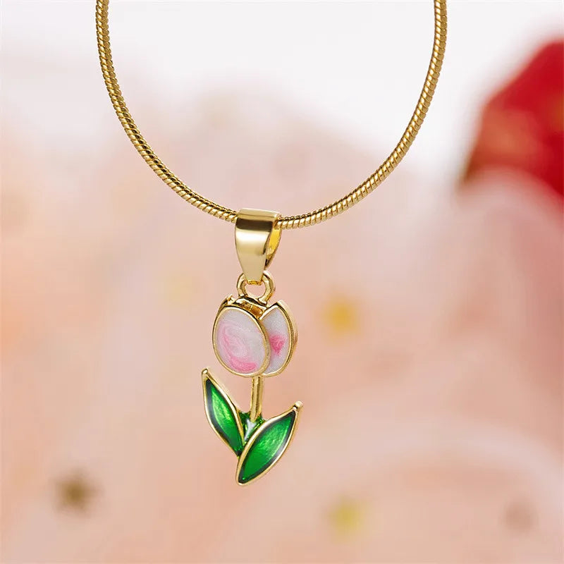 Necklace with white and pink colored enamel tulip flower pendant