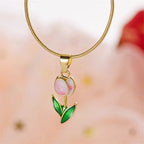 Necklace with white and pink colored enamel tulip flower pendant