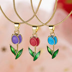 Necklace with red colored enamel tulip flower pendant