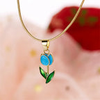 Necklace with turquoise colored enamel tulip flower pendant