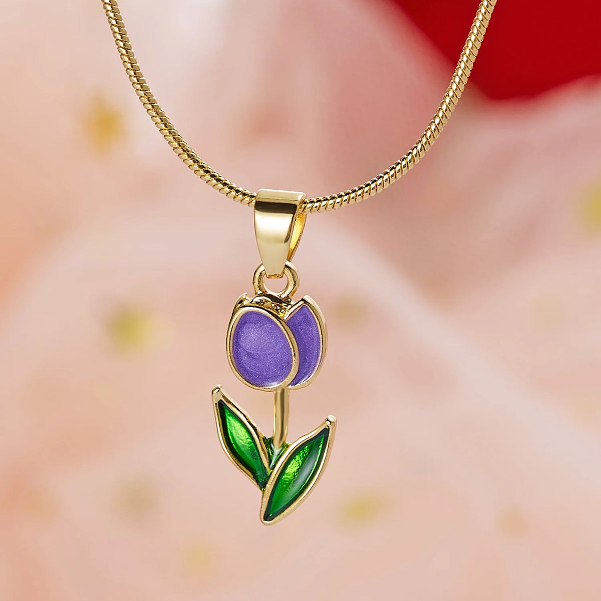 Necklace with purple colored enamel tulip flower pendant