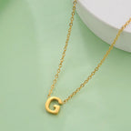Collier avec pendentif initiale - lettre