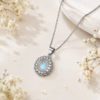 Necklace with oval moonstone pendant set with crystals