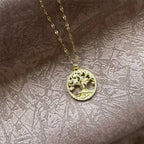 Collana con ciondolo rotondo albero della vita pavé di cristalli