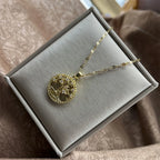 Necklace with round tree of life pendant paved with crystals
