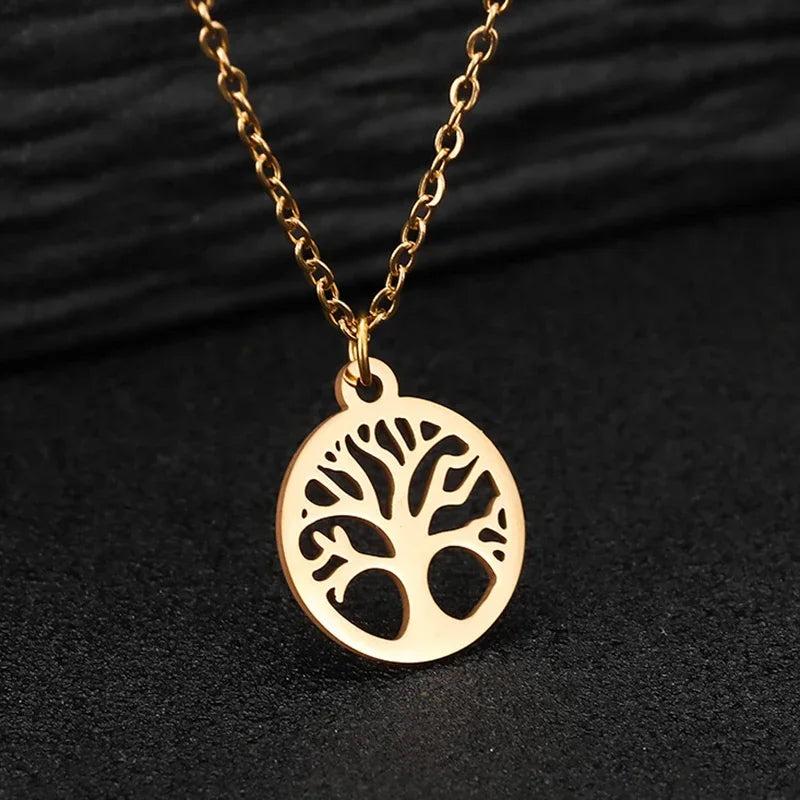 Fine necklace with openwork round tree of life pendant in gold