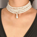 Collana multiplo giro con ciondolo perla goccia d'acqua oro