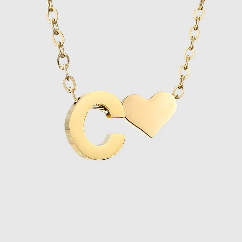 Women's necklace with heart pendant and initial - letter 