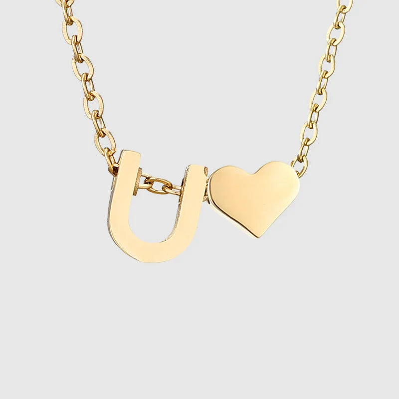 Women's necklace with heart pendant and initial - letter 