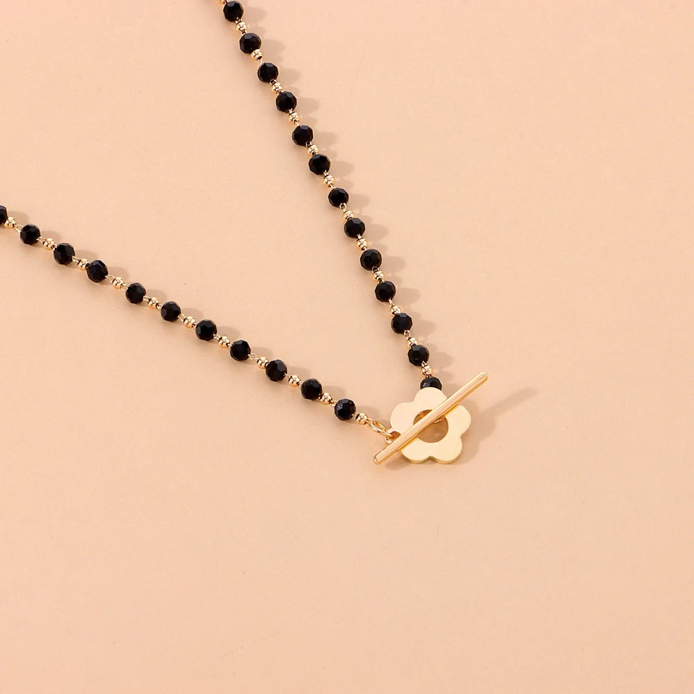 Halskette Choker Anhänger Blume schwarz und gold