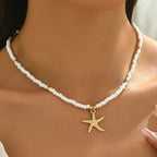 Collier ras du cou coquillage et étoile de mer blanc fines perles