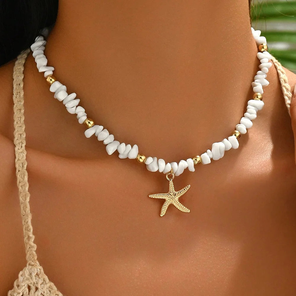 Collier ras du cou coquillage et étoile de mer blanc larges perles