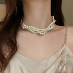 Collier torsadé avec pendentif perle