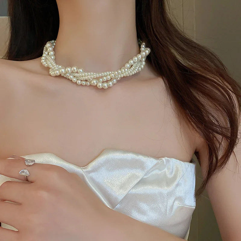 Collier torsadé avec pendentif perle