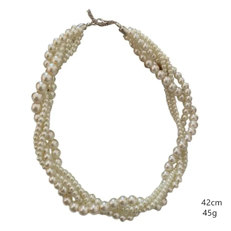 Collier torsadé avec pendentif perle