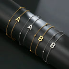 Pulsera de doble inicial oro y plata