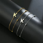 Pulsera de doble inicial oro y plata k