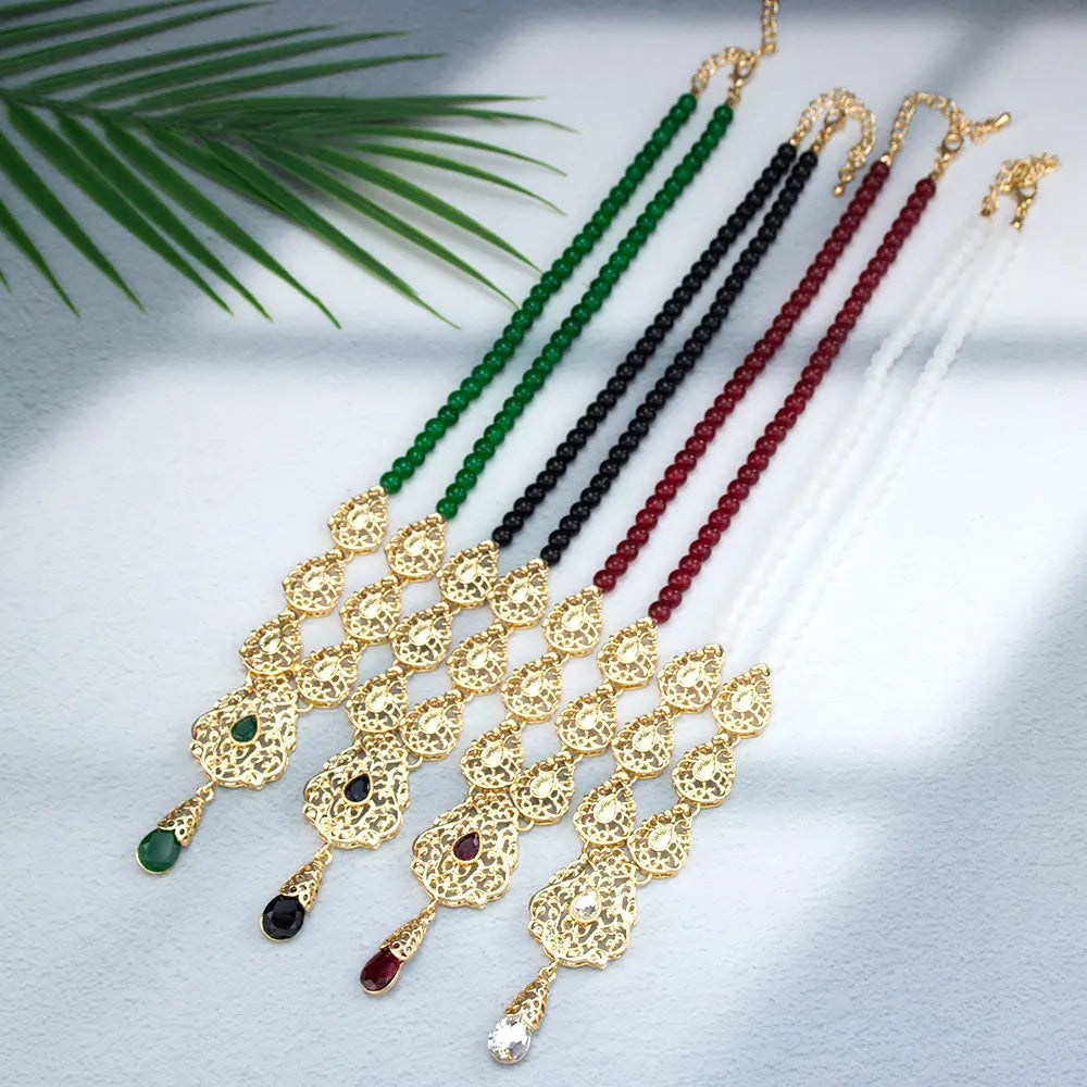 Långt halsband med traditionellt rött arabiskt bröllopshänge