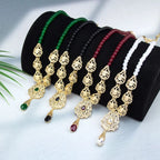 Långt halsband med traditionellt vitt arabiskt bröllopshänge