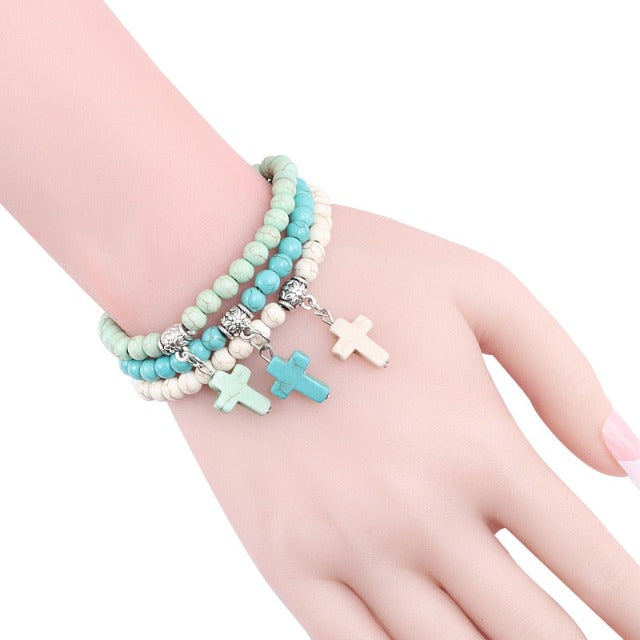 Perlenarmband mit Kreuz 