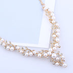 Parure di collana e orecchini da sposa con perle