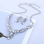 Parure di collana e orecchini da sposa con perle