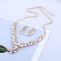 Parure di collana e orecchini da sposa con perle